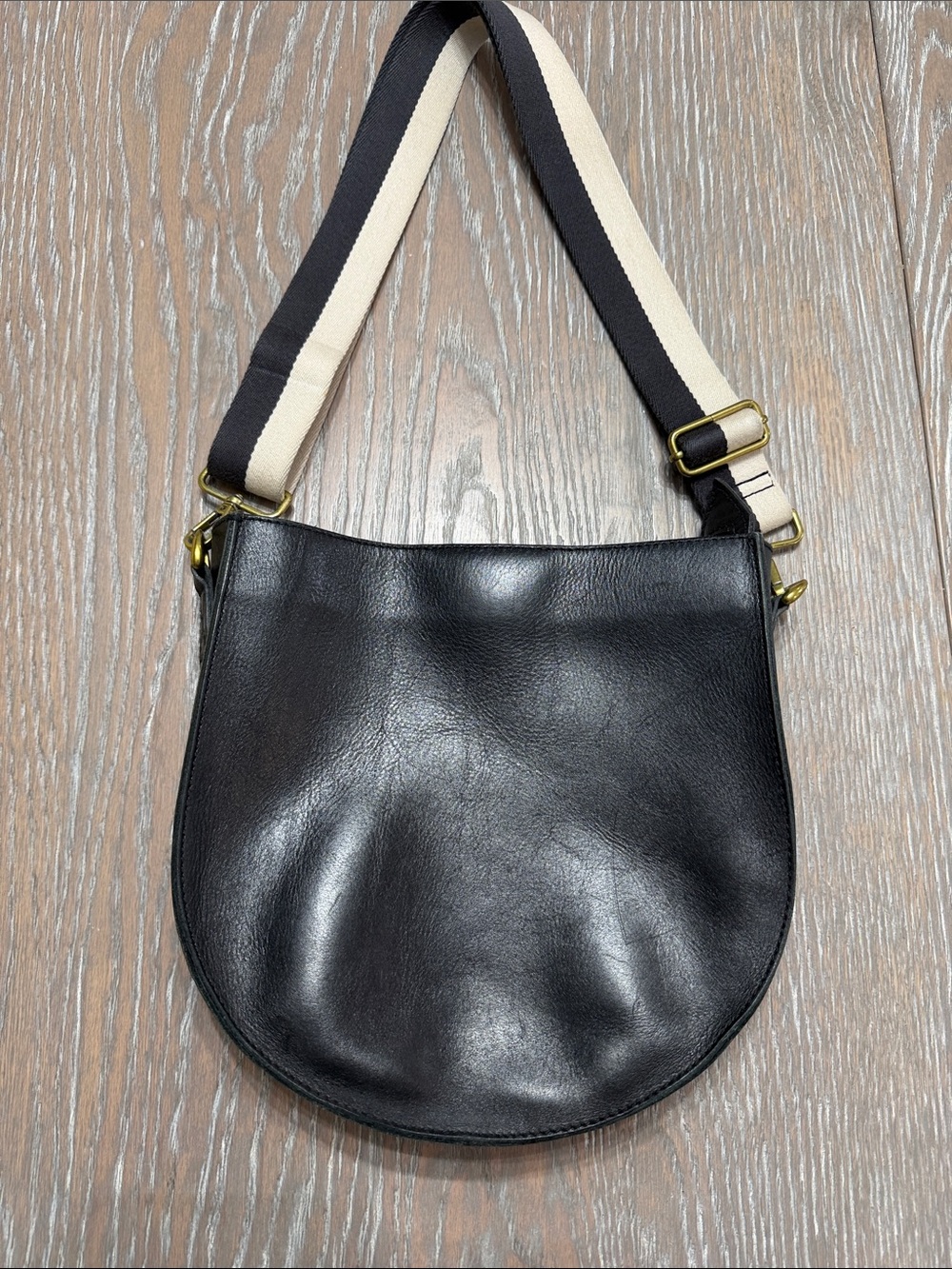 Madewell brand Black Leather Crossbody Saddle Bag with Striped Canvas Strap